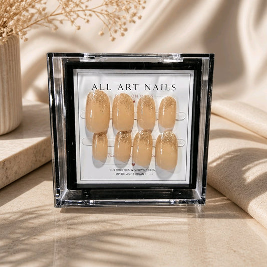 Champagne Dust nude press-on nagels met gouden glitter